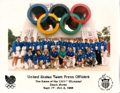 Chris Plonsky (center kneeling, green shirt) as a United States Team Press Officer at the Seoul Olympics in 1988.